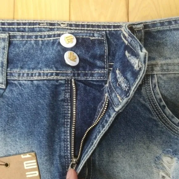 - NWOT Lanca Perfume sexy distressed cotton denim mini skirt lots of branding