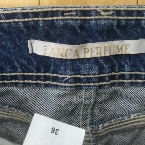 - NWOT Lanca Perfume sexy distressed cotton denim mini skirt lots of branding