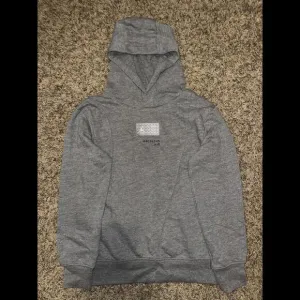 Air Jordan Big Kids (Boy’s) Paris Saint Germain Front Logo Fleece Grey PO Hoodie