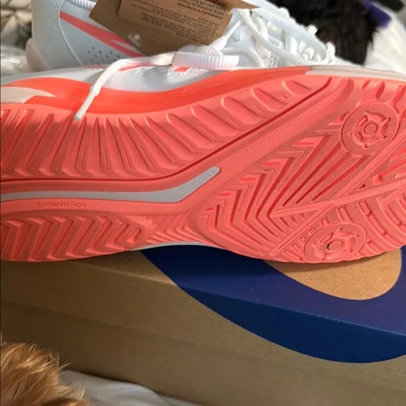 Asics White and Orange Athletic Shoes with Sleek Design