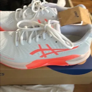 Asics White and Orange Athletic Shoes with Sleek Design