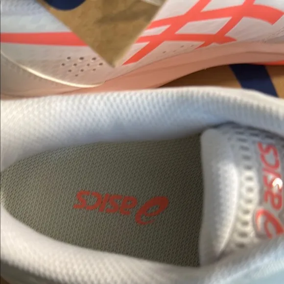 Asics White and Orange Athletic Shoes with Sleek Design