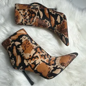 ASOS Brown and Black Heeled Boots with Sleek Design