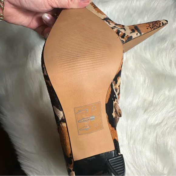 ASOS Brown and Black Heeled Boots with Sleek Design