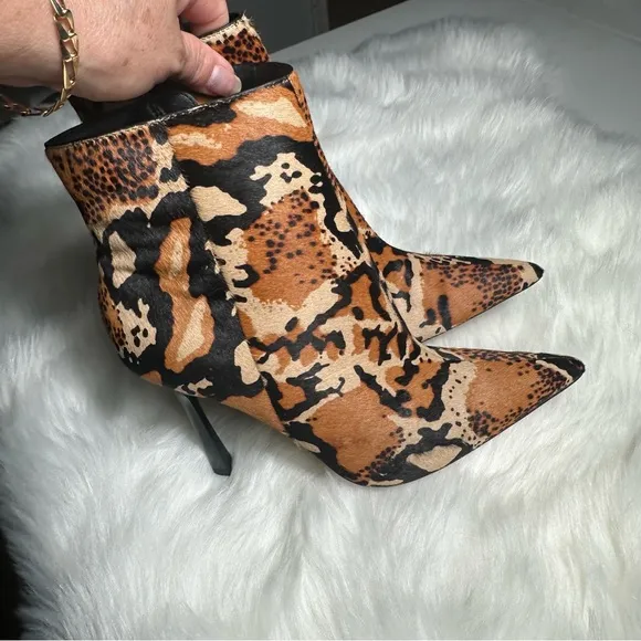 ASOS Brown and Black Heeled Boots with Sleek Design