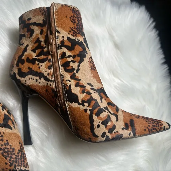 ASOS Brown and Black Heeled Boots with Sleek Design