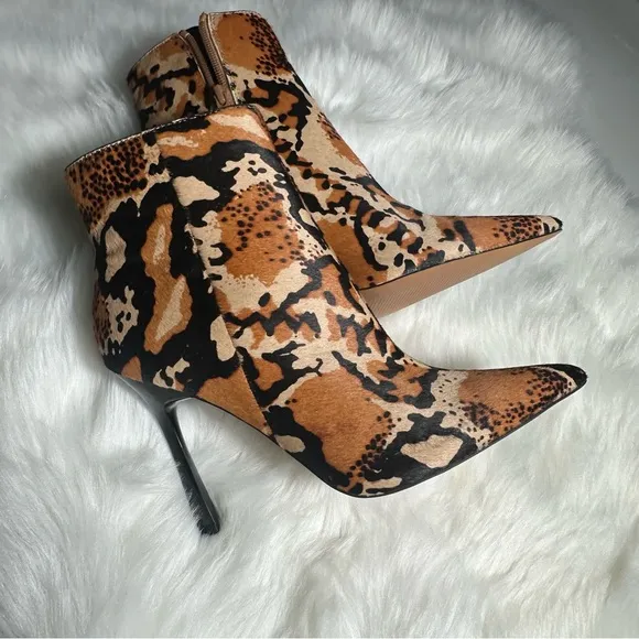 ASOS Brown and Black Heeled Boots with Sleek Design