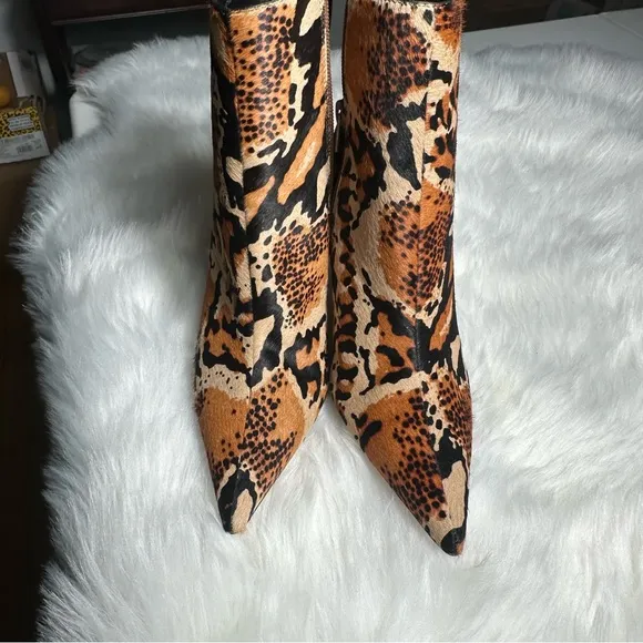 ASOS Brown and Black Heeled Boots with Sleek Design