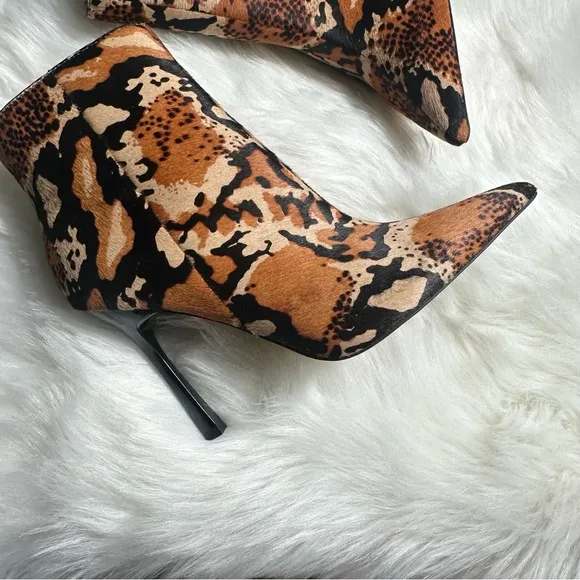 ASOS Brown and Black Heeled Boots with Sleek Design