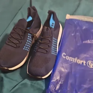 Blue and Black Athletic Shoes with Breathable Knit Design