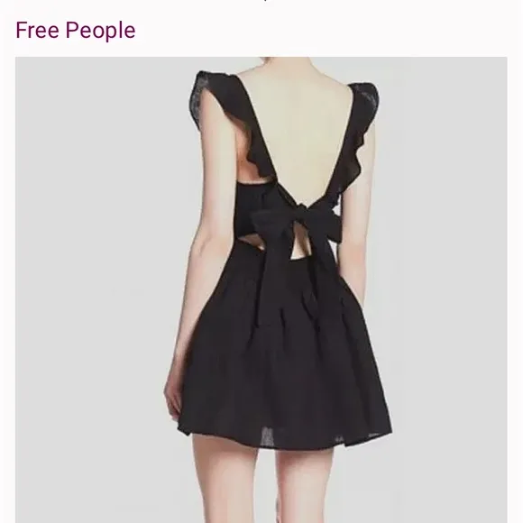 Free People linen blend beautiful ruffled back tie mini boho dress.