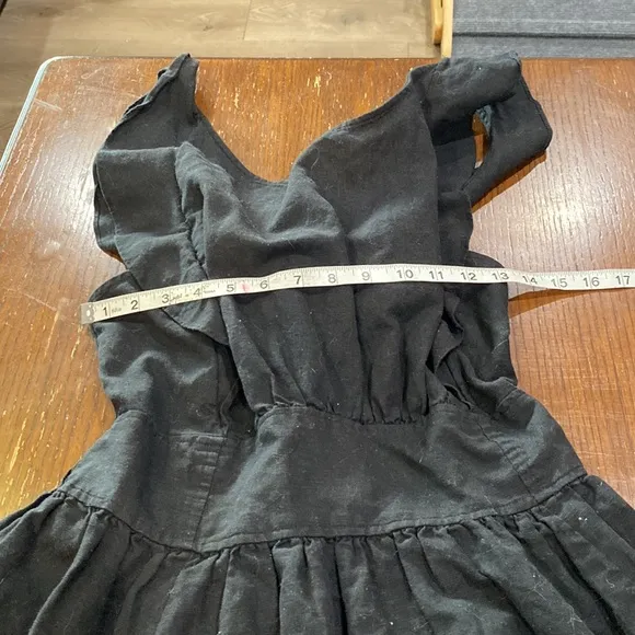 Free People linen blend beautiful ruffled back tie mini boho dress.