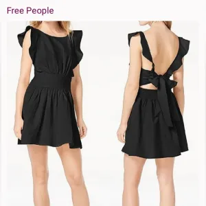 Free People linen blend beautiful ruffled back tie mini boho dress.
