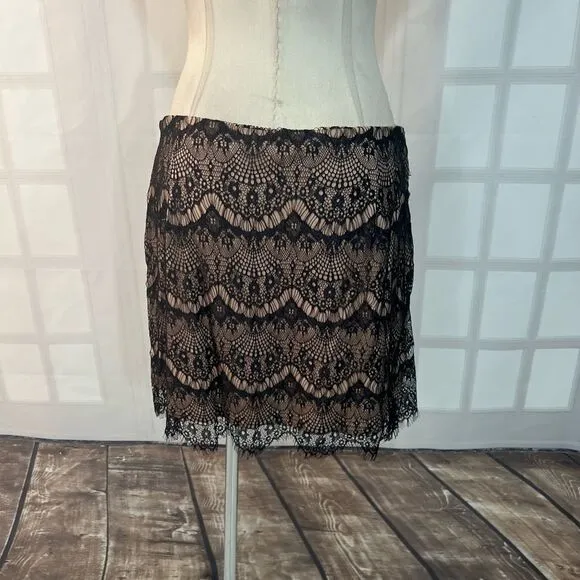 Free people NWT Zoey black lace nude lined ruched mini skirt size 12