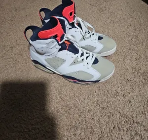 Jordan White and Blue Athletic Shoes with High-Top Design