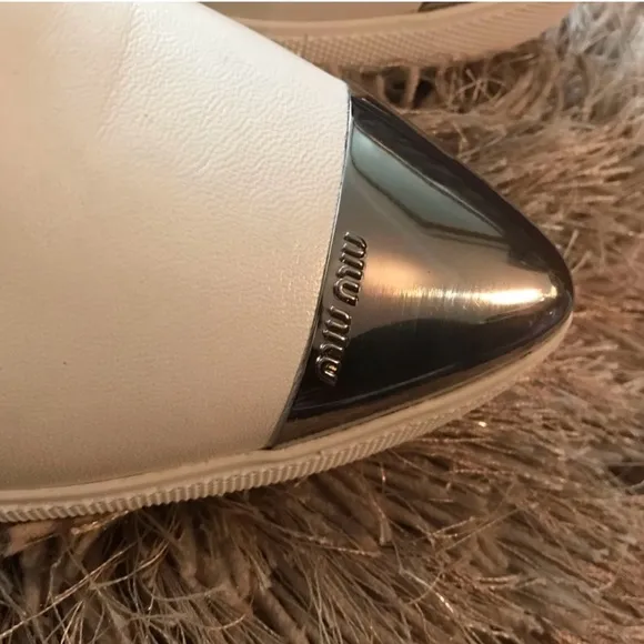 Miu Miu Off White Leather Slip-On Shoes with Silver Accents