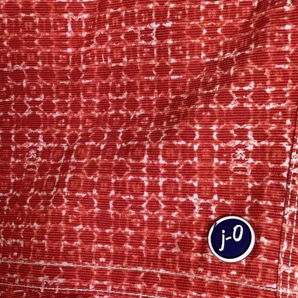 New. Johnnie-O red swim shorts. Small. Retails $89