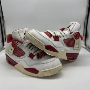 Nike White and Red Sneakers with Air Cushioning