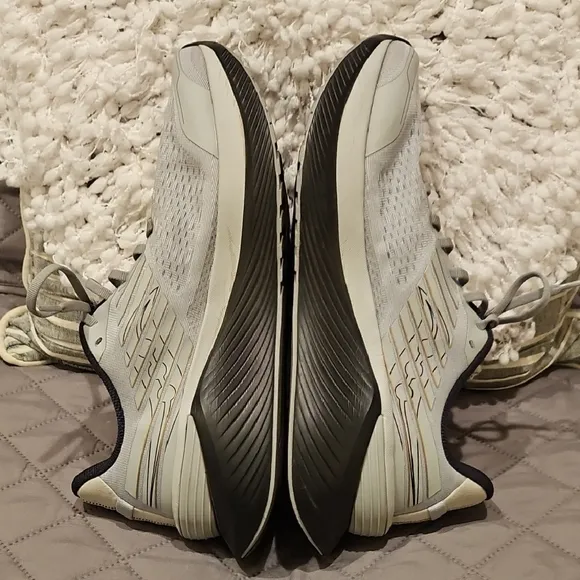 Saucony Athletic Shoes with Breathable Fabric and Curved Sole