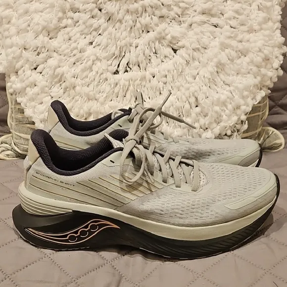 Saucony Athletic Shoes with Breathable Fabric and Curved Sole