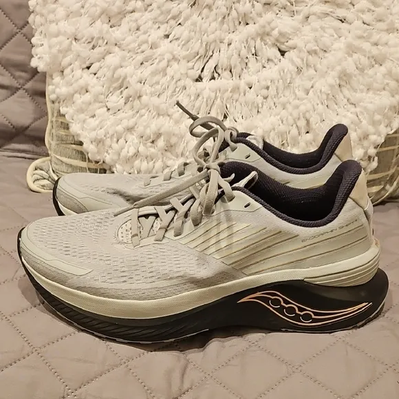 Saucony Athletic Shoes with Breathable Fabric and Curved Sole