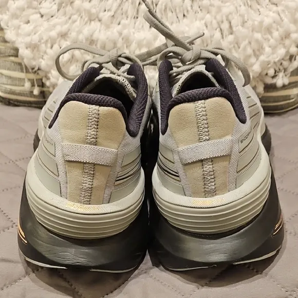 Saucony Athletic Shoes with Breathable Fabric and Curved Sole