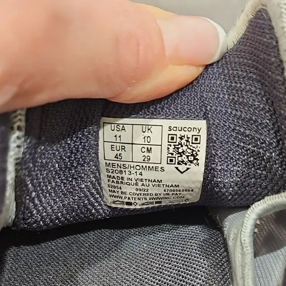 Saucony Athletic Shoes with Breathable Fabric and Curved Sole