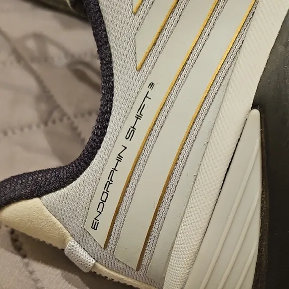 Saucony Athletic Shoes with Breathable Fabric and Curved Sole