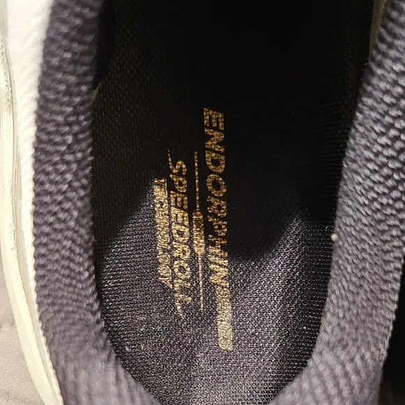 Saucony Athletic Shoes with Breathable Fabric and Curved Sole