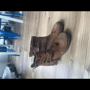 Tasseled Brown Suede Ankle Boots by Born