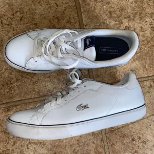 the lacoste sport flat sneakers white  leather