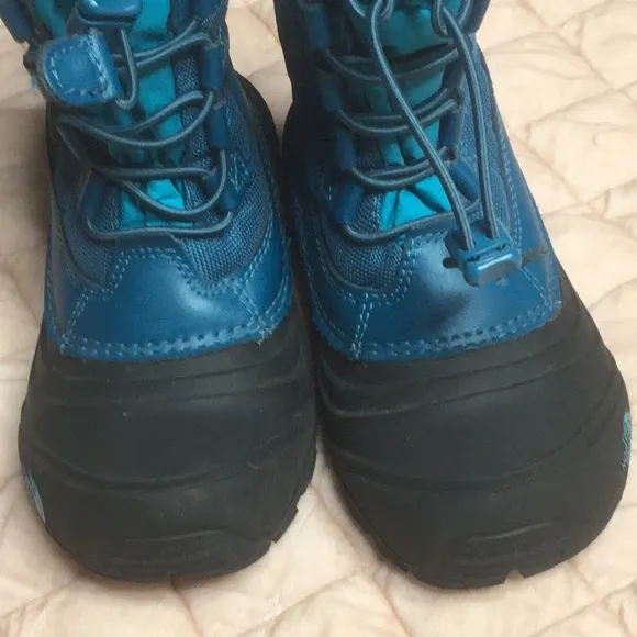 The North Face kids Alpenglow Thermafelt boots with inserts in both boots
